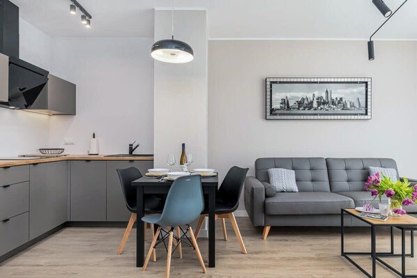 Living room with a comfortable sofa and TV. 