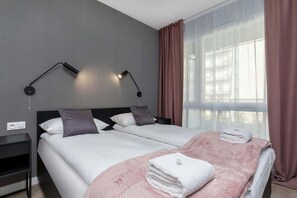 Cozy bedroom in the apartment.