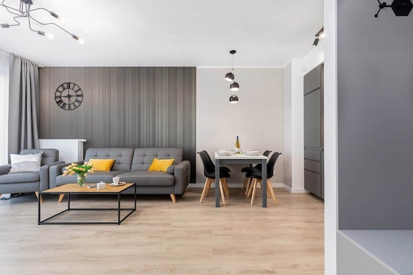 Living room with a comfortable sofa and TV.