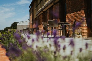 Terrace outside the cottages - each has their own area (Natalie D Photography)