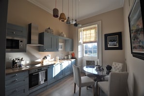 Fully fitted kitchen with dining