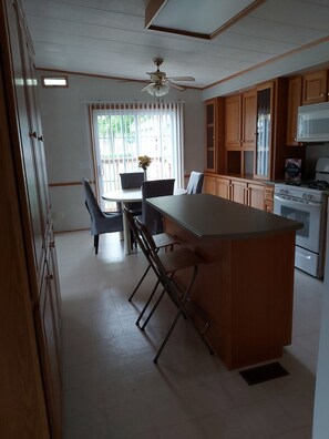 Lots of storage and work space as well as extra seating at island.