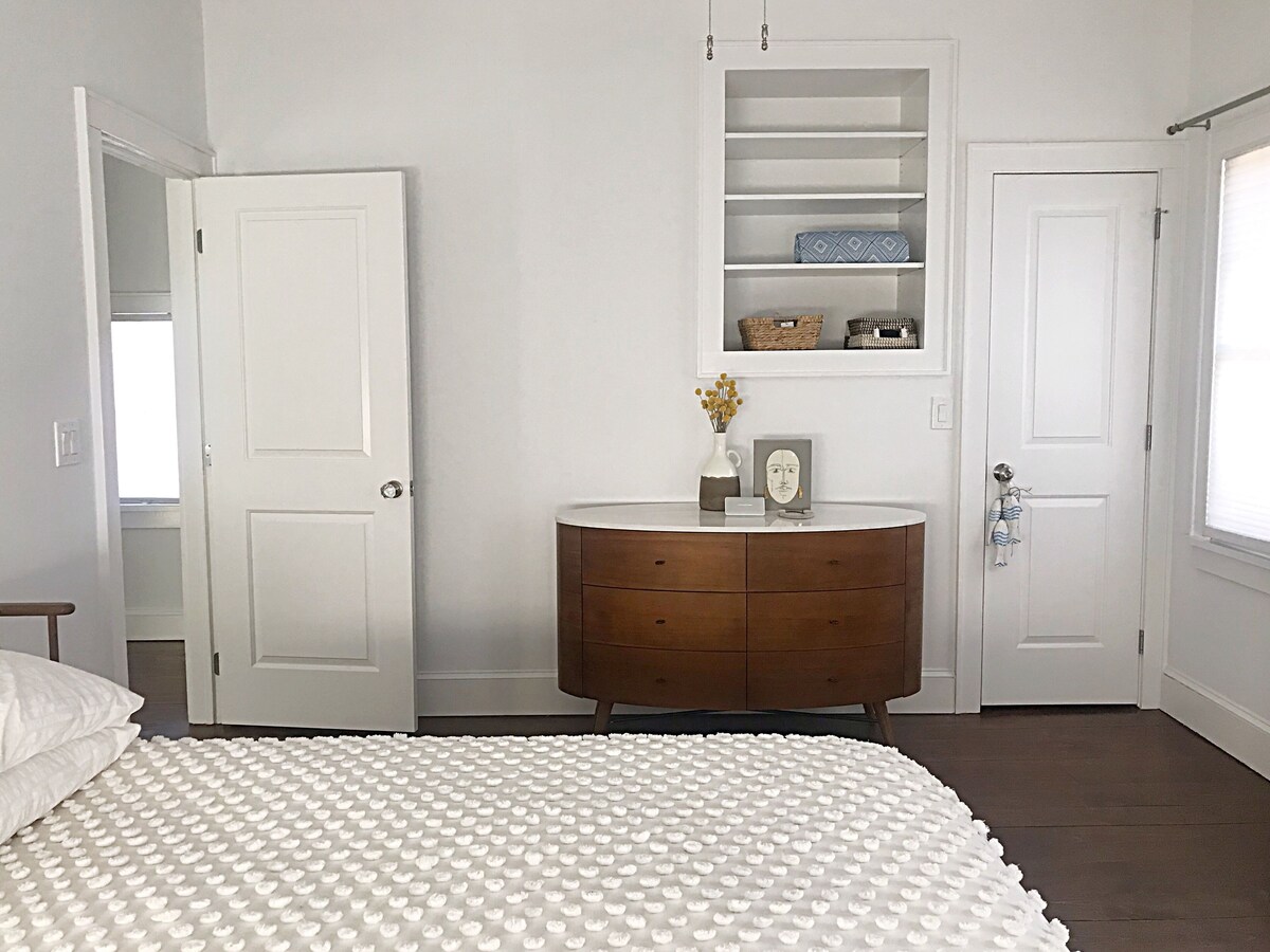 Relax in this light-filled home, steps from the beach and a short walk to town!