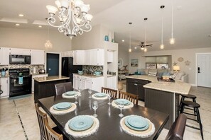 Dining Room: Elegant space with shimmering decor, perfect for meals and gatherings!