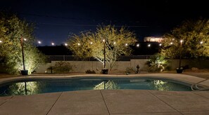 Outdoor Oasis: Unwind by the pool as the sun sets, casting golden hues over your getaway!