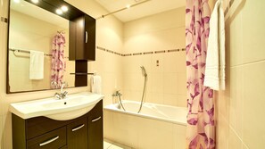 Get ready for your day in the lovely bathroom.