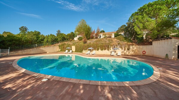 Embrace the warmth of nature with our sun-kissed pool, where the gentle embrace of the sun's rays naturally heats the water for your comfort.
