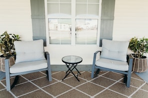 Front porch, enjoy your coffee in the morning while rocking.