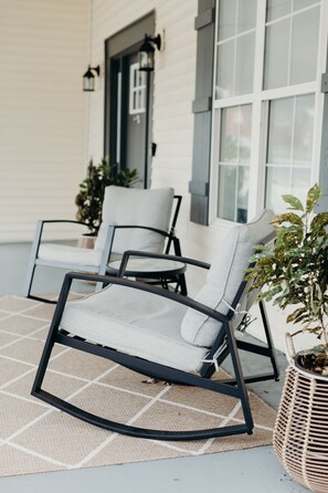 Front porch with rocking chairs