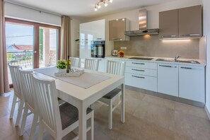 Kitchen area. kitchen + dining area