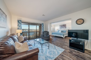 Living area with queen sleeper sofa and gorgeous view of Lake Hamilton!