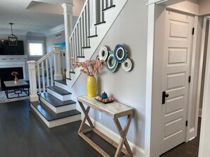 Front entrance and door to walk in pantry