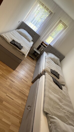 3 Bett Zimmer