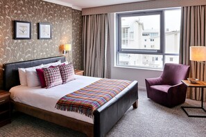 Relax on the comfy bed after a day outside.
