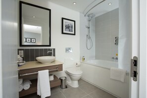 Get ready for your day in the lovely bathroom - Please note the bathroom may feature a shower or a bathtub.