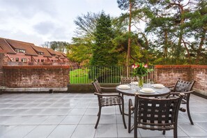 Rooftop terrace with dining set to enjoy meals under the open sky.
