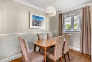 A cozy dining area with seating for intimate meals or conversations.