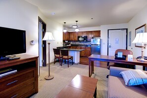 Sink into the cozy sofa after a day exploring the area.