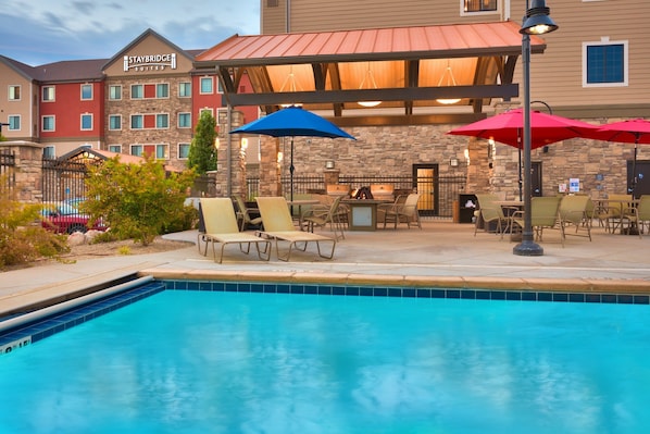 Relax by the shared outdoor pool.