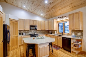 Large kitchen with great island to gather with friends or family.