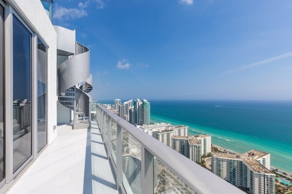 "Balcony","Railing","Town","Building","City"