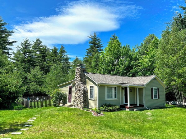 Nestled in the trees, this home has easy access to Cannon Mountain, Bretton Woods and all that the White Mountains have to offer