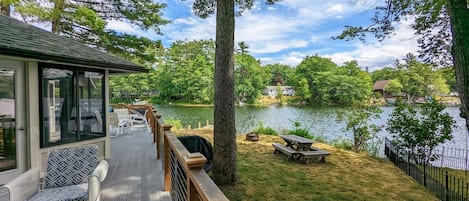 View of the back yard and lake