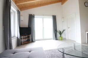 Ferienwohnung mit Balkon für 2-4 Personen 60qm-Wohnbereich