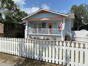 Front yard has picket fence, back has 6 ft wood privacy fence