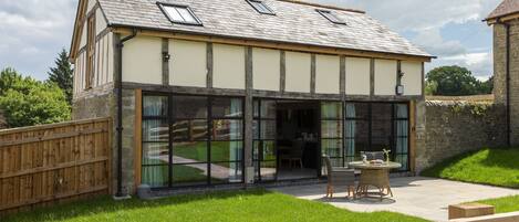 The Timber Barn occupies a pretty, rural spot on the Downton Estate