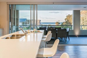 The kitchen highlights inspiring ocean views.