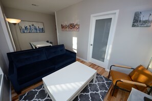 Living Room With 55" 4K Smart TV, Cable And DVD Player