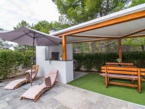 Furniture, Plant, Shade, Tree, Outdoor Furniture, Building, Table, Leisure, Wood, Outdoor Table