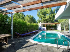 Property, Plant, Water, Azure, Shade, Swimming Pool, Sky, Outdoor Furniture, Lighting, Architecture