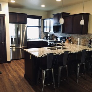 Granite kitchen with breakfast bar