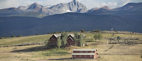 Your home is the red building in the foreground. Capitol Peak/Mt. Sopris views.