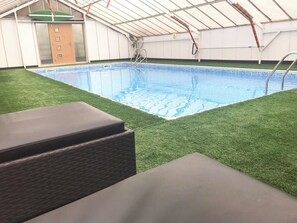 32ft by 16ft swimming pool located in the front garden