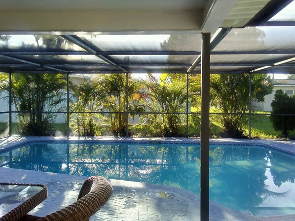 Lounge by our heated pool.