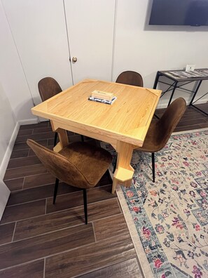 Game table for playing dominos, card games, or board games. 
