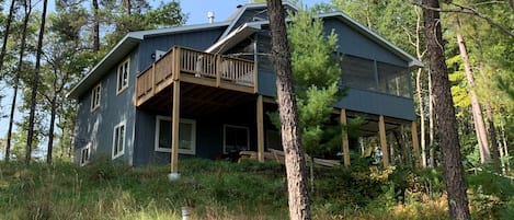 Perched on a hill, this lovely house looks out over beautiful Lake Nancy.