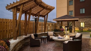 Share laughs around the outdoor fire pit with your group.