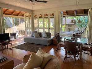 Spacious living area with wrap-around lanai - indoor and outdoor dining
