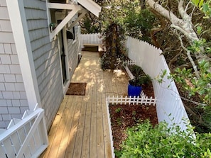 Front door entrance with outdoor shower.