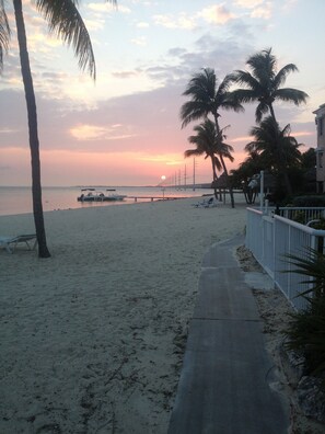 View of the beach in front of the condo's pool area