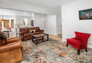 Open floor plan to kitchen and dining area