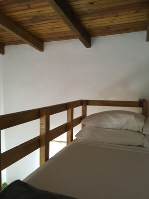 Comfy full mattress in loft with plenty of pillows, fresh sheets + reading lamp