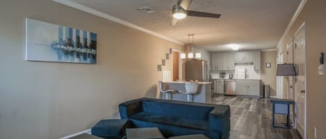 Cozy living room area at a glance, flat screen TV with cable provided