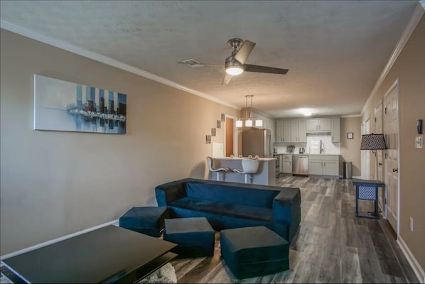 Cozy living room area at a glance, flat screen TV with cable provided