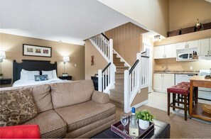 2-story open concept condo. shown here is main level, upstairs is loft bedroom