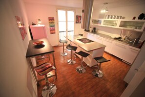 Modern kitchen is heart of the house on 2nd floor